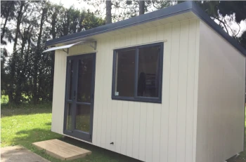 A cabin used by an orchard as a site office