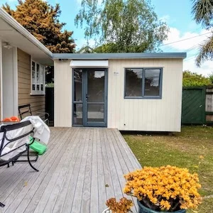 A large Cabin King cabin beside a deck